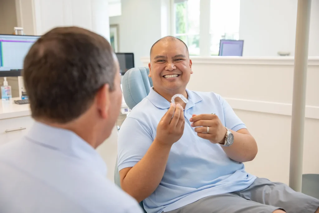 dr lazzara and patient with clear aligners
