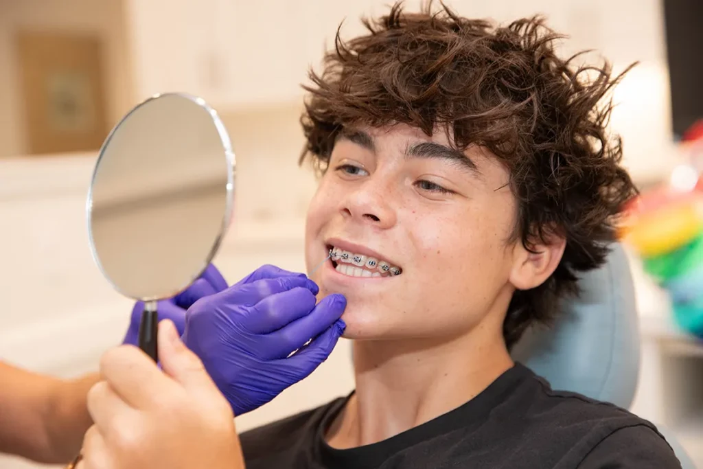 teen with modern braces